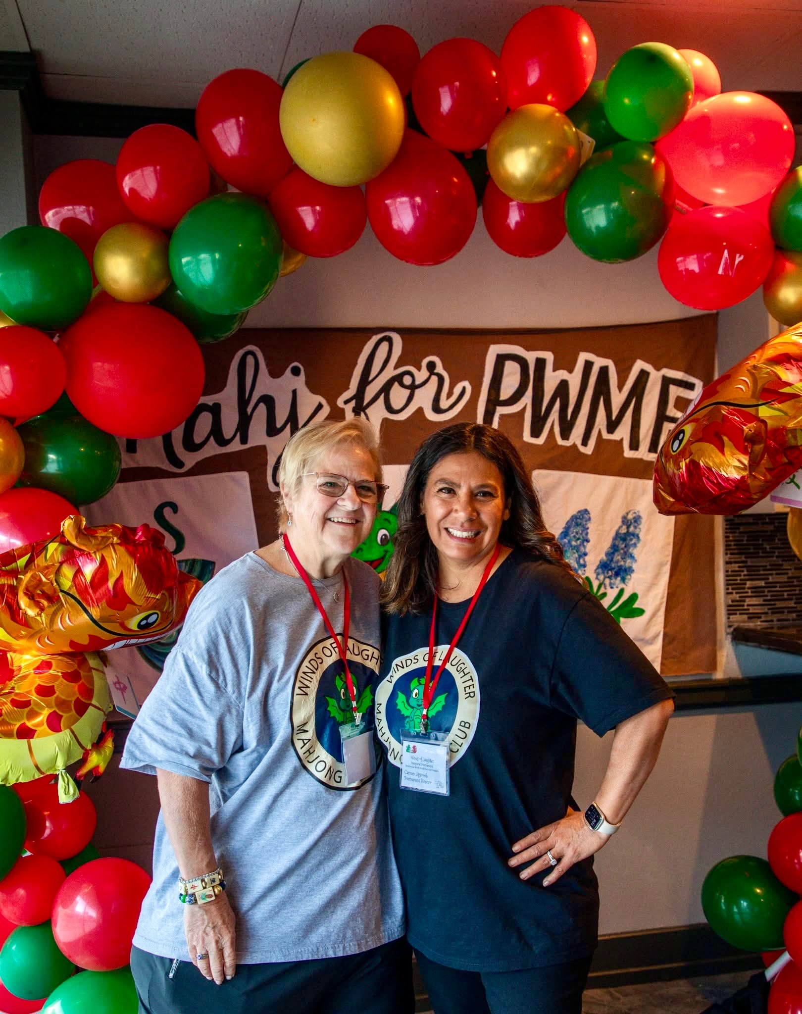 Carmen and Happy at the Mahi for PWMF event under balloon arch