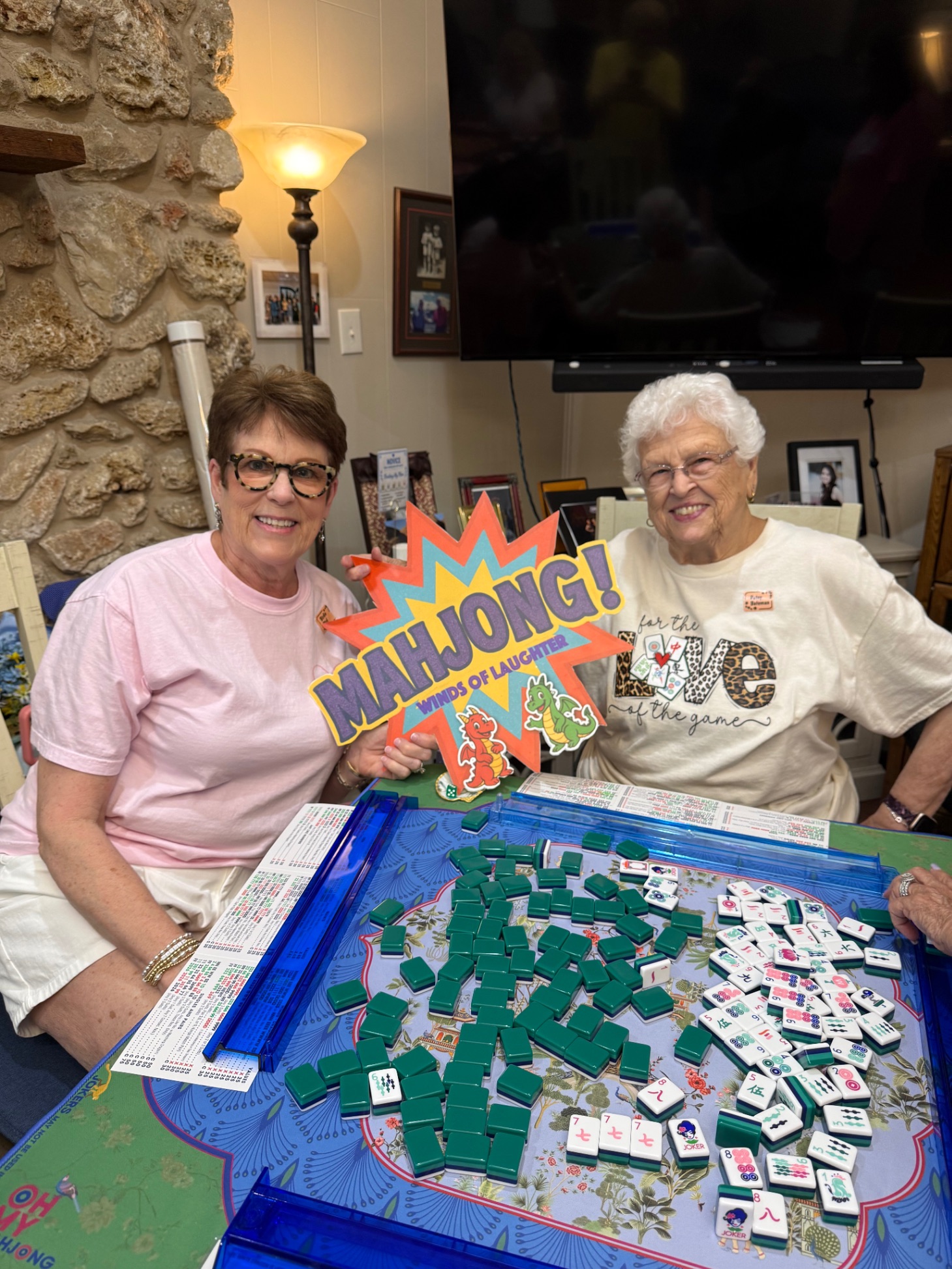 Carmen and Happy playing mahjong